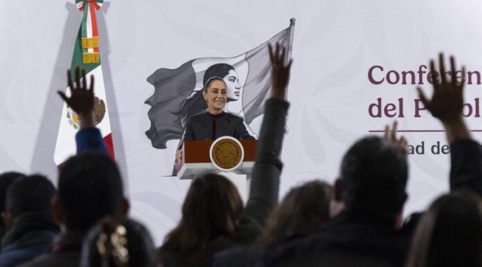 President Sheinbaum looks out over the press pool at her morning conference