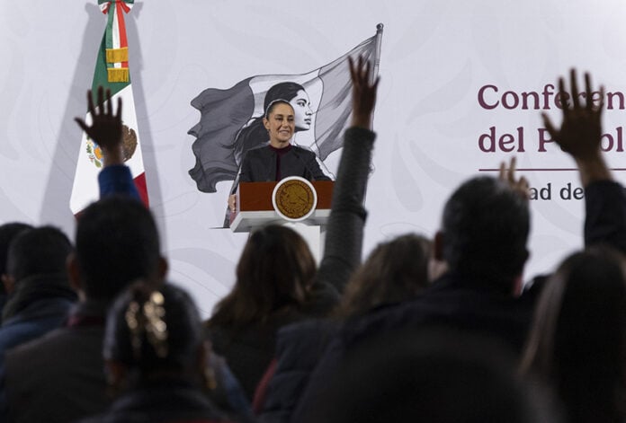 President Sheinbaum looks out over the press pool at her morning conference