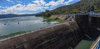 The Valle de Bravo dam, with a full reservoir behind it