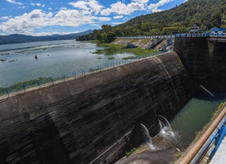 The Valle de Bravo dam, with a full reservoir behind it