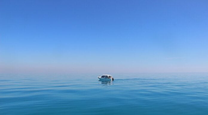 a boat in the middle of the ocean