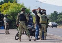 a person being detained by Mexican authorities