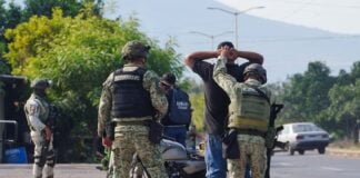a person being detained by Mexican authorities