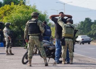 a person being detained by Mexican authorities