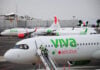Viva Aerobus planes at the Mexico City airport with Volaris planes visible in the background