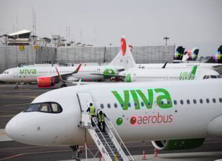 Viva Aerobus planes at the Mexico City airport with Volaris planes visible in the background