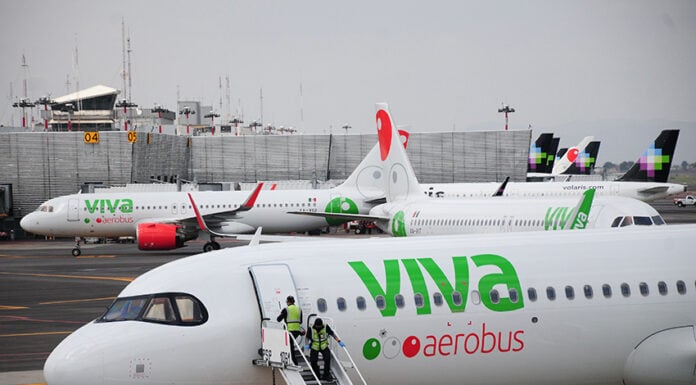 Viva Aerobus planes at the Mexico City airport with Volaris planes visible in the background