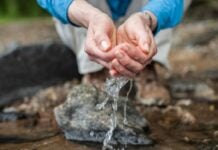 Water running through fingers