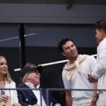 Cadillac driver Sergio Pérez with Tommy Hilfiger and wife Dee Hilfiger at the 2025 U.S. Open.