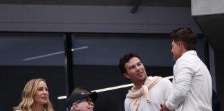 Cadillac driver Sergio Pérez with Tommy Hilfiger and wife Dee Hilfiger at the 2025 U.S. Open.