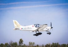 A Halcón 2.1 light plane flies