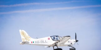 A Halcón 2.1 light plane flies