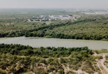 The Nuevo Laredo International Wastewater Treatment Plant in Mexico seen across the Rio Grande from Laredo.