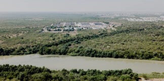 The Nuevo Laredo International Wastewater Treatment Plant in Mexico seen across the Rio Grande from Laredo.