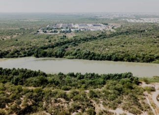 The Nuevo Laredo International Wastewater Treatment Plant in Mexico seen across the Rio Grande from Laredo.