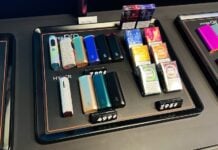 Kyiv, Ukraine - February 04, 2025: Selection of vaping devices, flavored pods, and accessories on a store counter display