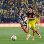 Club América forward Alex Zendejas breaks past Monterrey's defense during a November 24 soccer match