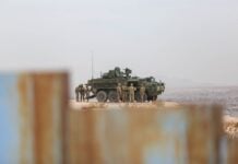 U.S. military on a tank near the U.S.-Mexico border