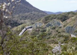 According to reports, the train traveled at excessive speed during a period of over an hour before it derailed. It is unknown whether the driver — who was arrested on Monday — was properly alerted to his speed or whether the train had any speed control mechanisms.