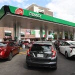 Cars lined up to pump gas at a Pemex gas station in Mexico