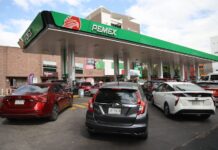 Cars lined up to pump gas at a Pemex gas station in Mexico
