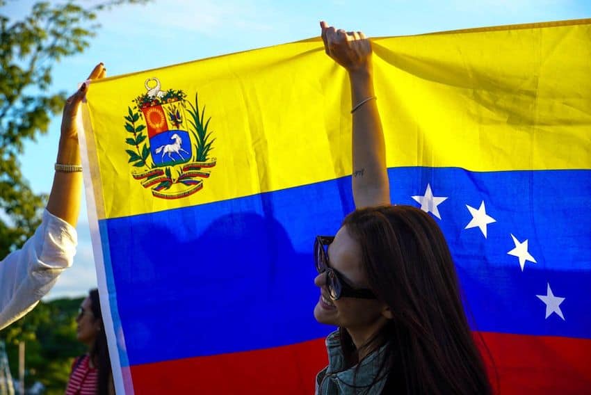 A woman celebrates on Saturday in Cancún, Quintana Roo, which is home to approximately 11,000 Venezuelans. 