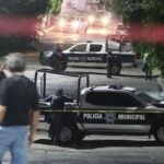 a person observing a crime scenewith cop cars from afar