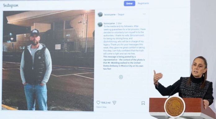 Sheinbaum stands before an image of Ryan Wedding presented at her morning press conference on Jan. 26, 2026