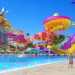 A rendering shows children and families playing at the planned Perfect Day Mahahual water park