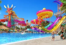 A rendering shows children and families playing at the planned Perfect Day Mahahual water park