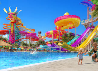 A rendering shows children and families playing at the planned Perfect Day Mahahual water park