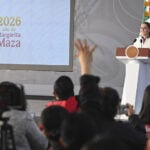 Press raise their hands at President Claudia Sheinbaum's morning conference