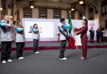 Mexico’s President Claudia Sheinbaum leads the flag-bearing ceremony for the Mexican Olympic delegation following her daily press conference on Monday.