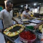 Bakers preparing Rosca de Reyes in Mexico
