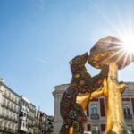 a monumental sculpture of Madrid’s symbol, the Bear and the Madroño, featuring a Huichol design