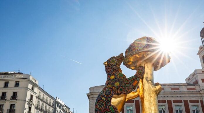 a monumental sculpture of Madrid’s symbol, the Bear and the Madroño, featuring a Huichol design