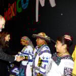 The king of Spain shakes hands with Mexico's tourism delegation at the tourism festival FITUR in Madrid