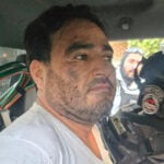 Michoacan accused crime boss El Botox in a police car