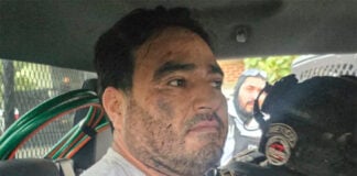 Michoacan accused crime boss El Botox in a police car