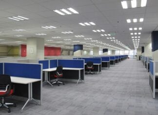 Empty room of office cubicles