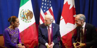 Mexican president Sheinbaum, Trump and Canada PM Carney sit in front of their countries' flags
