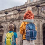 A father with two small children at Mexico City's Chapultepec palace
