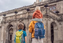 A father with two small children at Mexico City's Chapultepec palace