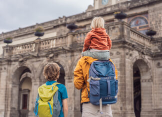 A father with two small children at Mexico City's Chapultepec palace