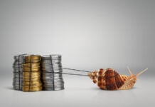 A snail pulls a pile of coins