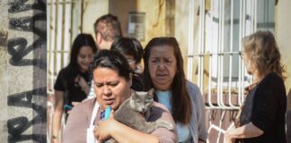 People evacuating during an earthquake alarm in Mexico City