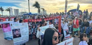 a group of mothers protesting at the Mazatlán Carnival