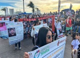 a group of mothers protesting at the Mazatlán Carnival