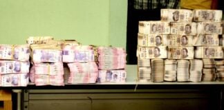 stacks of peso bills signaling corruption