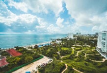 An aerial view of hotels and coastline in Cancún